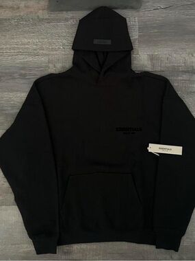 Essentials Men’s Black Pullover Hoodie with Subtle Logo
